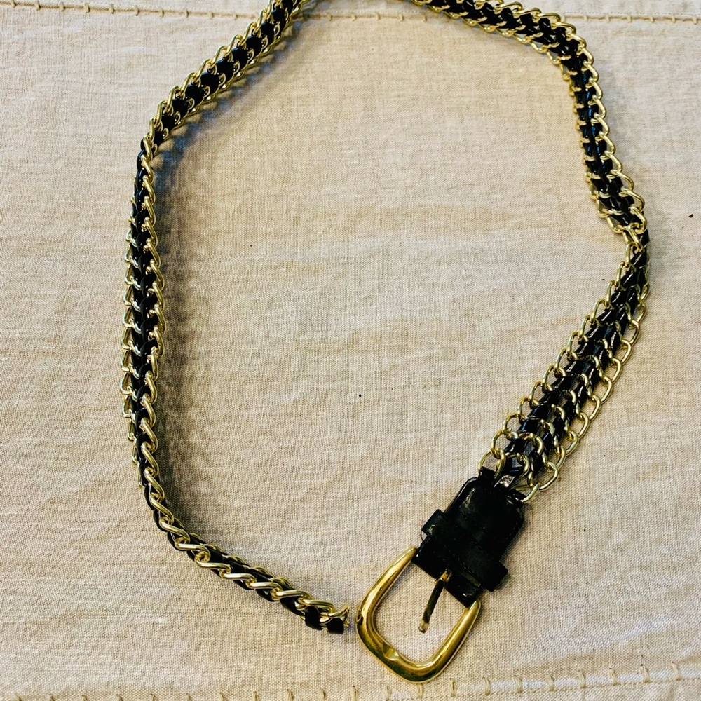 Black leather gold chain encased womens medium belt with gold buckle